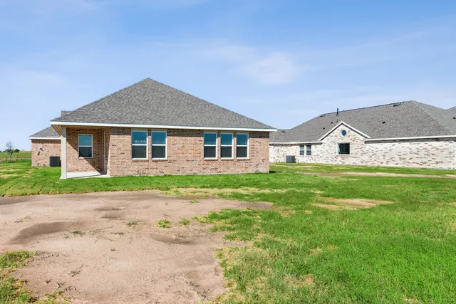 a view of a living room and kitchen