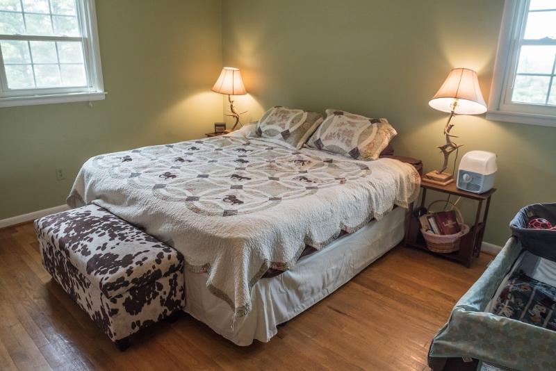 5072 Old Pike Road Pilot, VA 24138 - Photo 20 of 55 a bedroom with a bed and a window