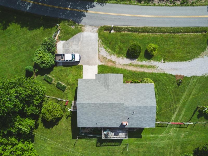5072 Old Pike Road Pilot, VA 24138 - Photo 51 of 55 an aerial view of a house with a garden and plants