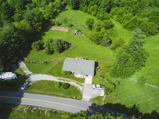 5072 Old Pike Road Pilot, VA 24138 - Photo 52 of 55 an aerial view of a house with a garden