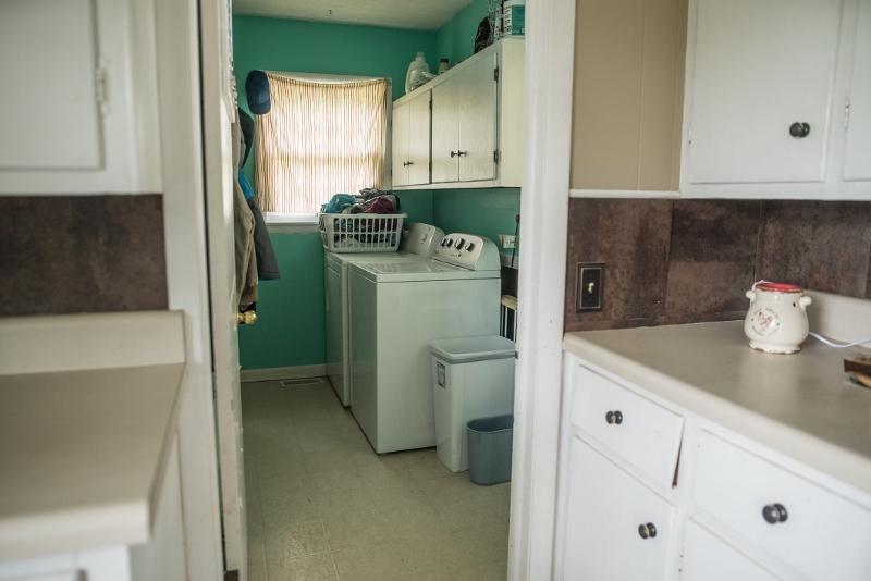 5072 Old Pike Road Pilot, VA 24138 - Photo 7 of 55 a kitchen with a refrigerator and sink
