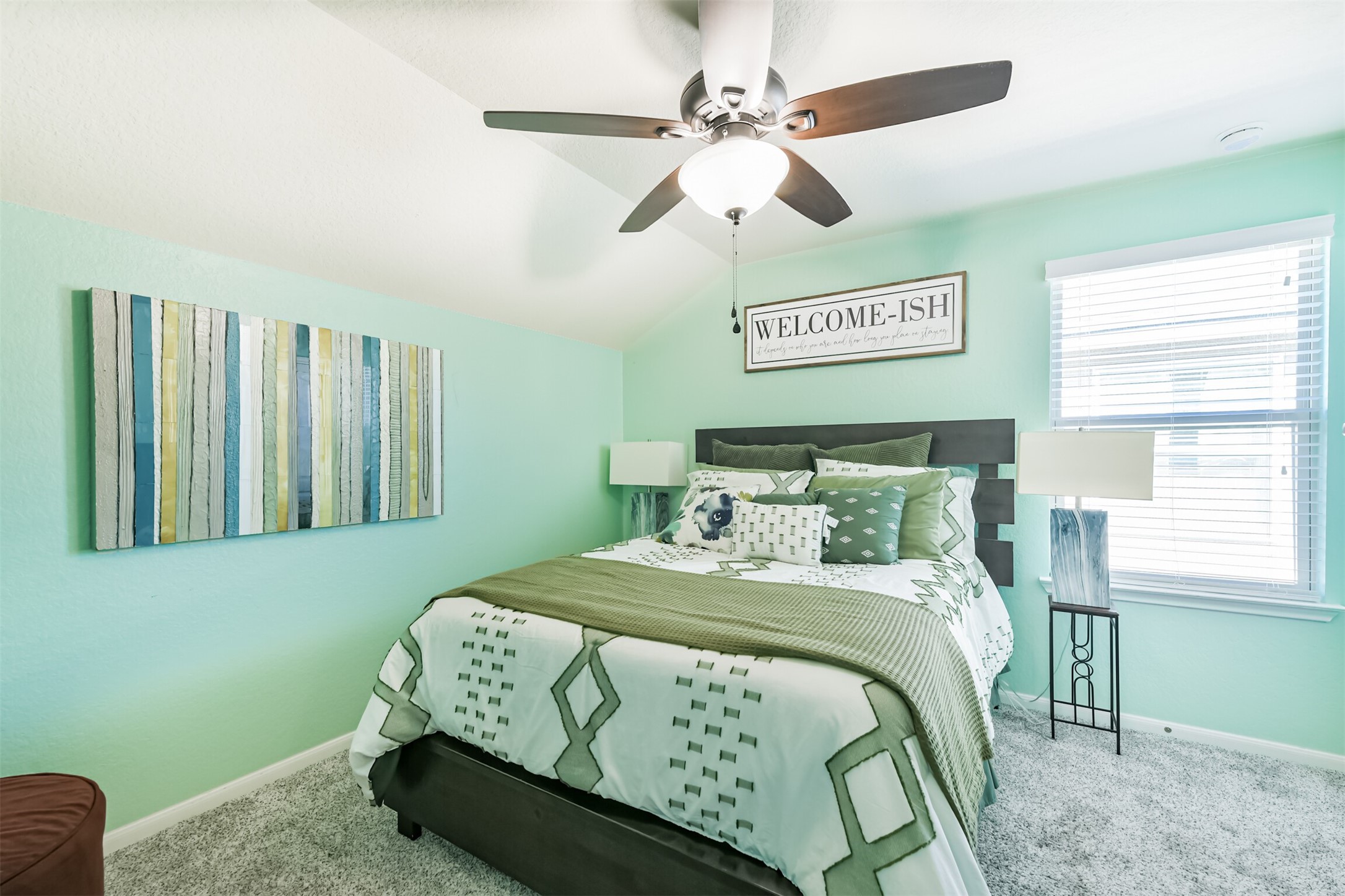 24047 Schults Meadow Lane Spring, TX 77389 - Photo 39 of 47 a bedroom with a bed ceiling fan and a window