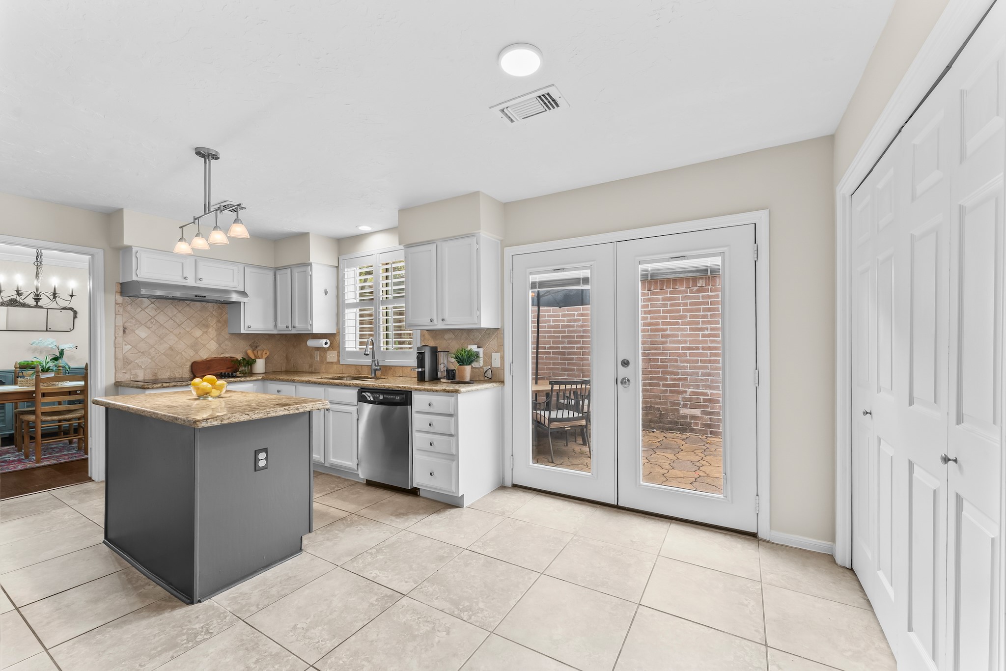 1546 Beaconshire Houston, TX 77077 - Photo 12 of 29 a kitchen with stainless steel appliances granite countertop a stove and a refrigerator