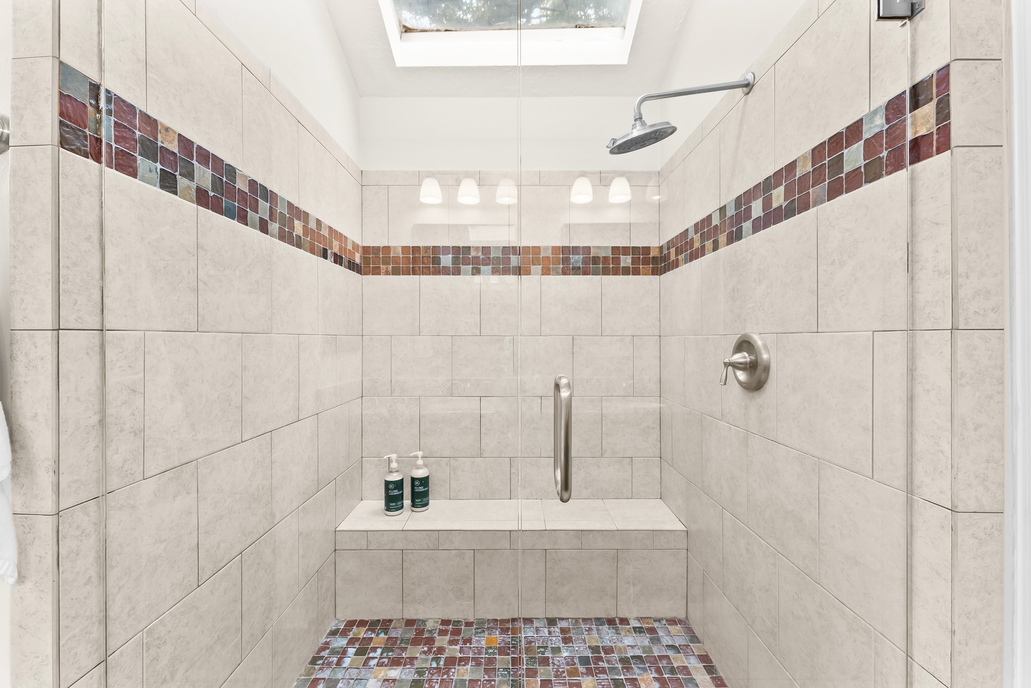 1546 Beaconshire Houston, TX 77077 - Photo 19 of 29 a bathroom with a bathtub and a shower