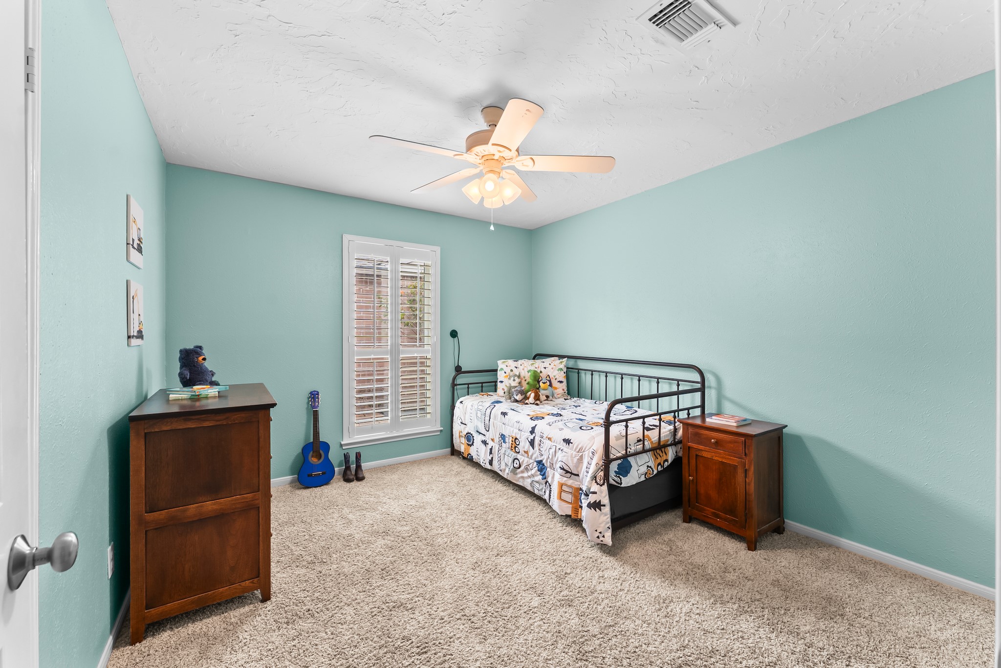 1546 Beaconshire Houston, TX 77077 - Photo 21 of 29 a bedroom with furniture and a window