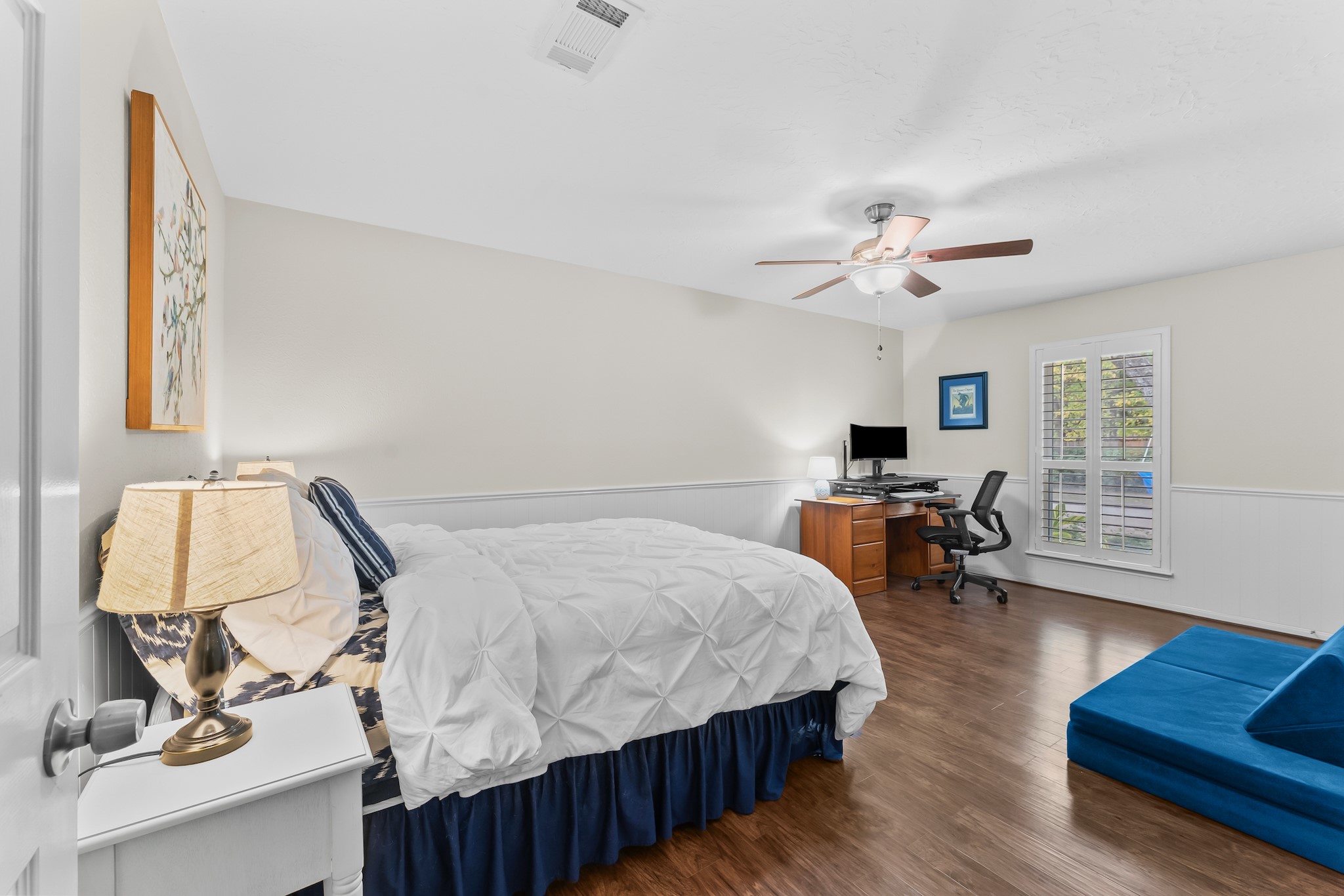 1546 Beaconshire Houston, TX 77077 - Photo 24 of 29 a bed room with a bed window and a chair