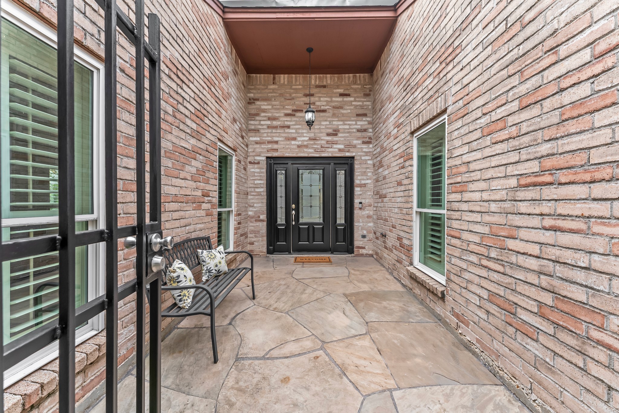 1546 Beaconshire Houston, TX 77077 - Photo 3 of 29 a view of an entryway with a door