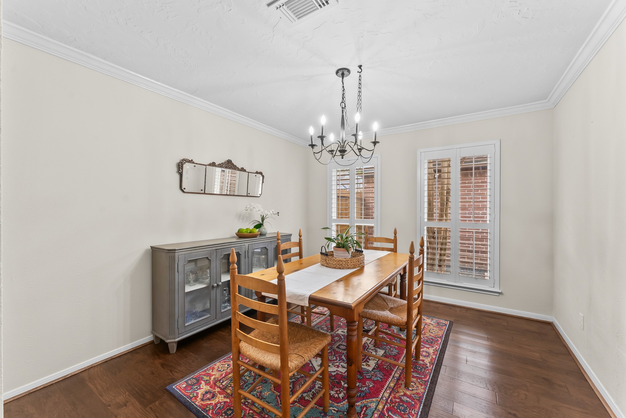1546 Beaconshire Houston, TX 77077 - Photo 8 of 29 a view of a dining room with furniture window and wooden floor