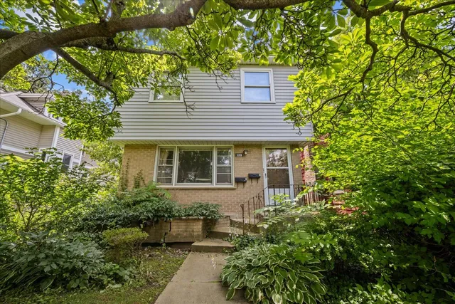 a view of backyard with a patio
