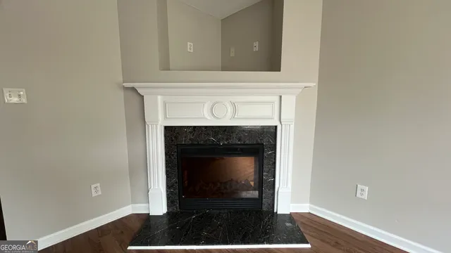 a room with a fireplace
