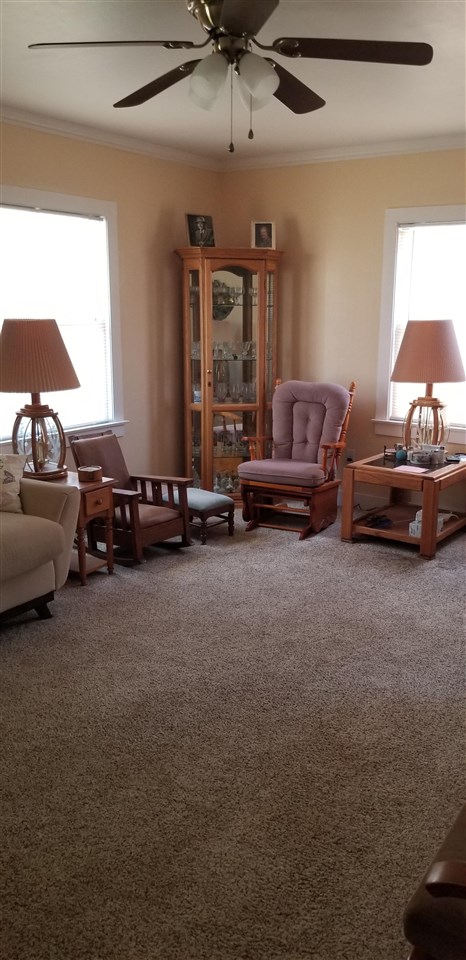 381 Aleut Street Biggs, CA 95917 - Photo 13 of 35 a living room with furniture and a large window