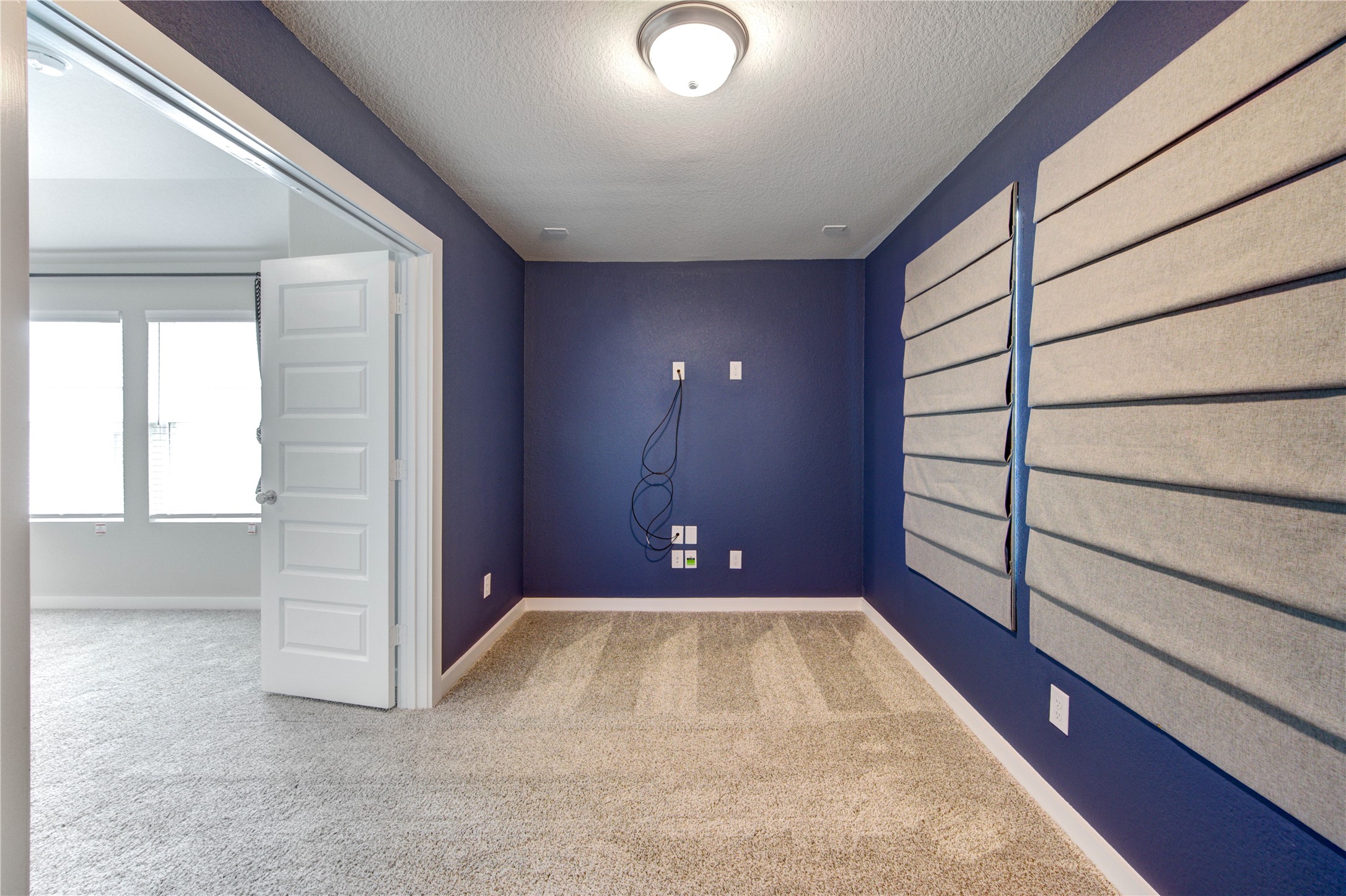 6027 Jenna Way Rosenberg, TX 77471 - Photo 36 of 50 Media Room Upstairs with windows