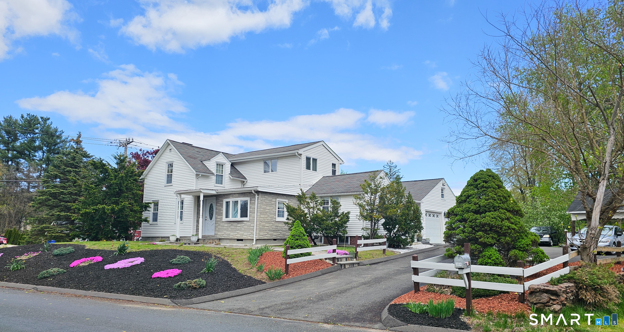 384 Long Hill Road South Windsor, CT 06074 - Photo 1 of 40 a front view of a house with a yard