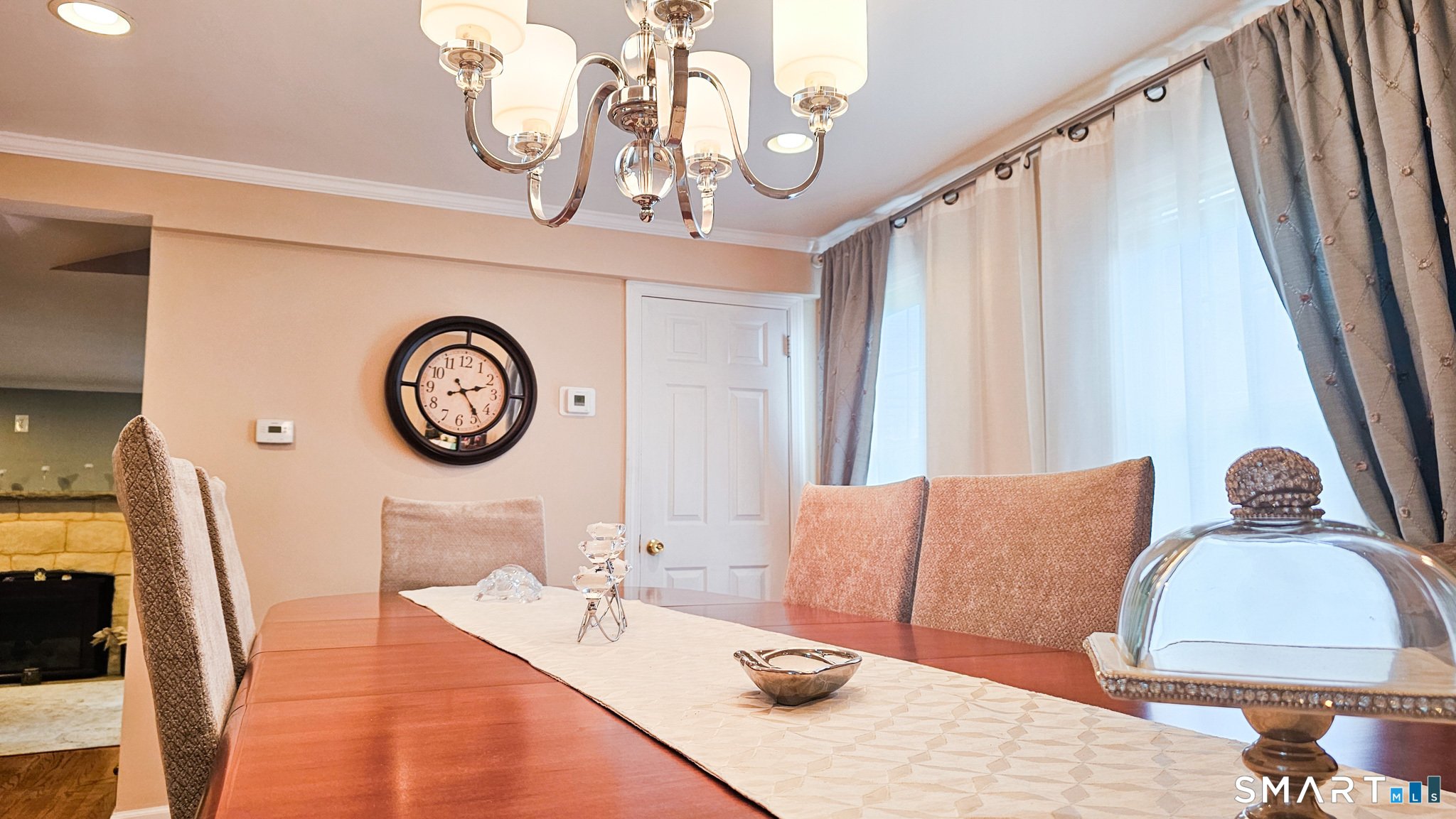 384 Long Hill Road South Windsor, CT 06074 - Photo 14 of 40 a living room with furniture and a large window