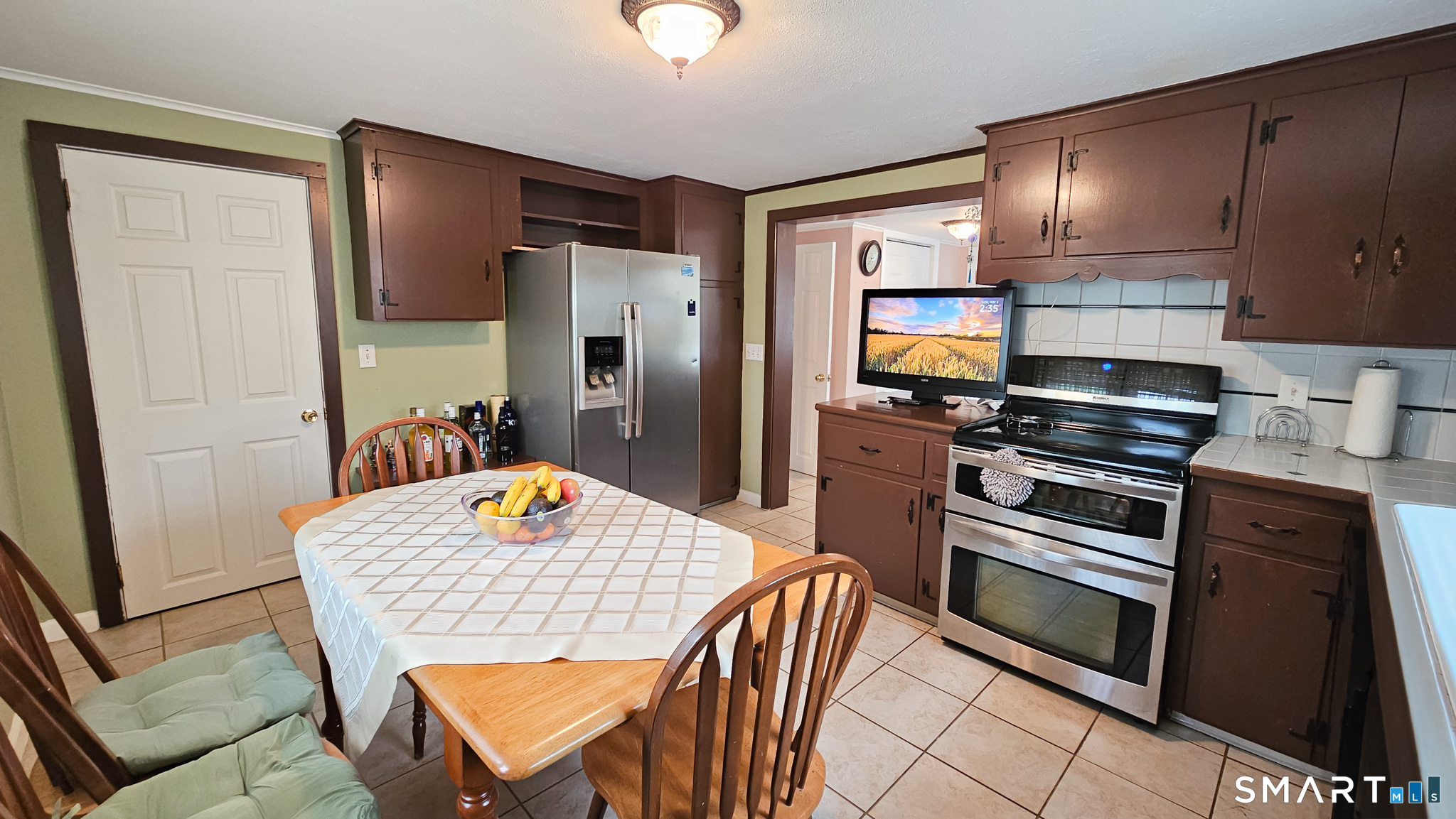 384 Long Hill Road South Windsor, CT 06074 - Photo 15 of 40 a kitchen with a sink appliances and cabinets