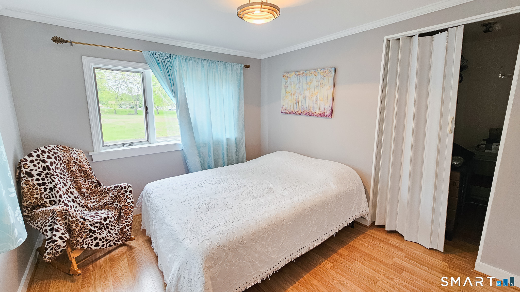 384 Long Hill Road South Windsor, CT 06074 - Photo 22 of 40 a bedroom with a bed and a window
