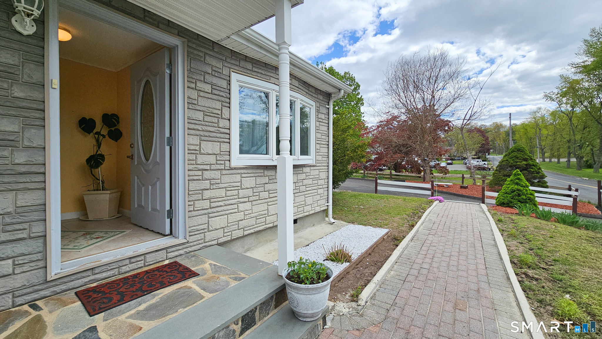 384 Long Hill Road South Windsor, CT 06074 - Photo 5 of 40 a view of a back yard of the house