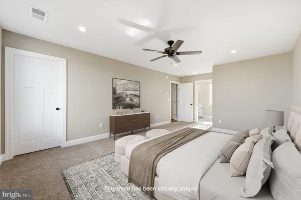a bedroom with a large bed