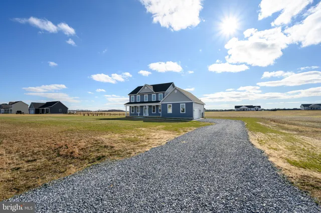a view of a swimming pool and an outdoor space