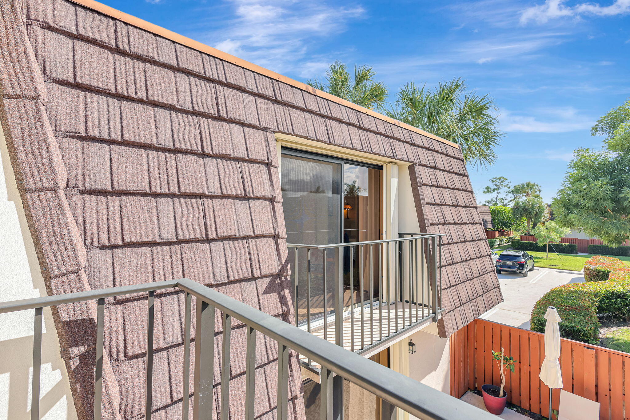 2332 23rd Court, Unit 57D Jupiter, FL 33477 - Photo 34 of 53 a view of outdoor space with swimming pool