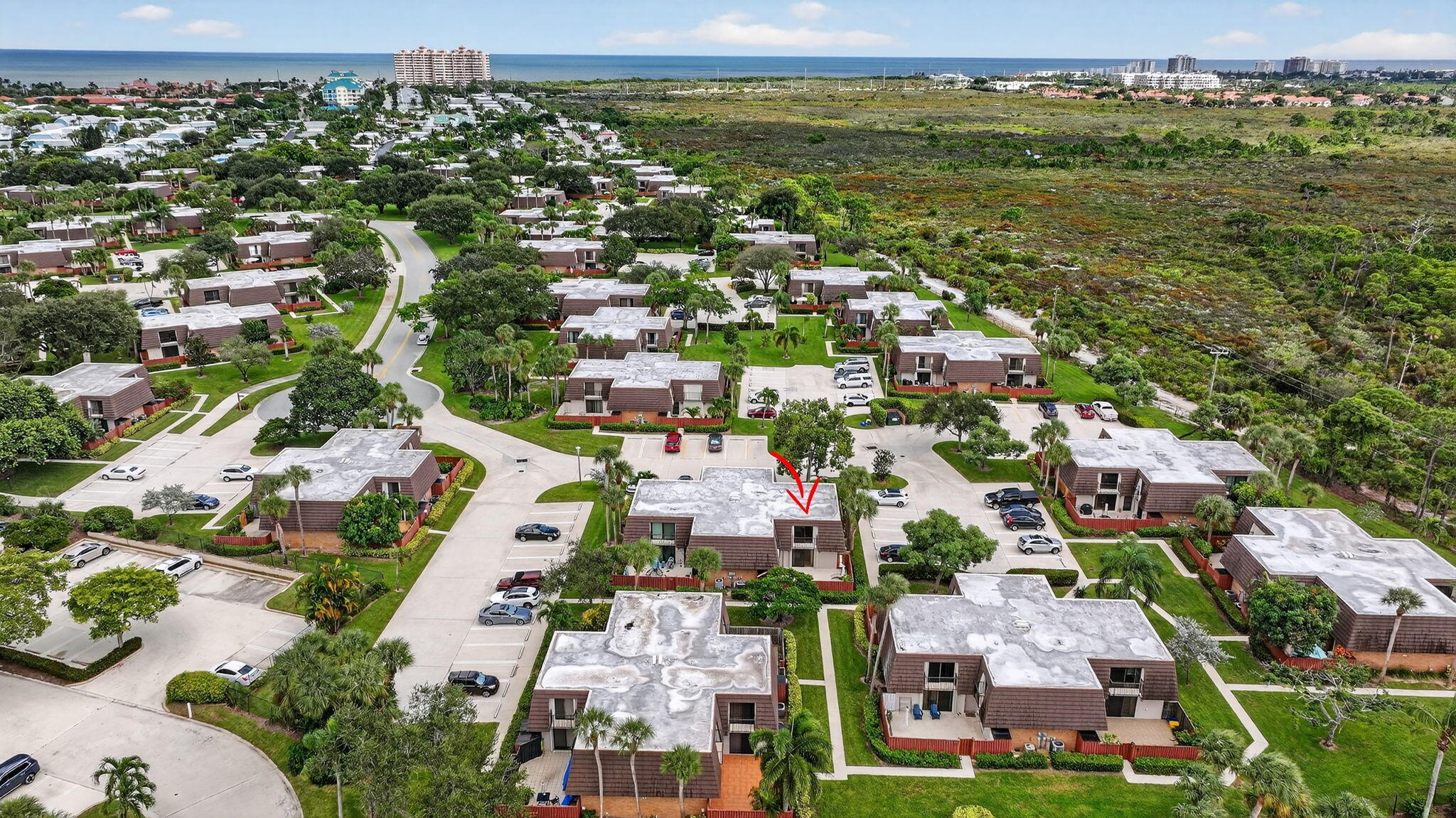 2332 23rd Court, Unit 57D Jupiter, FL 33477 - Photo 38 of 53 an aerial view of residential houses with outdoor space