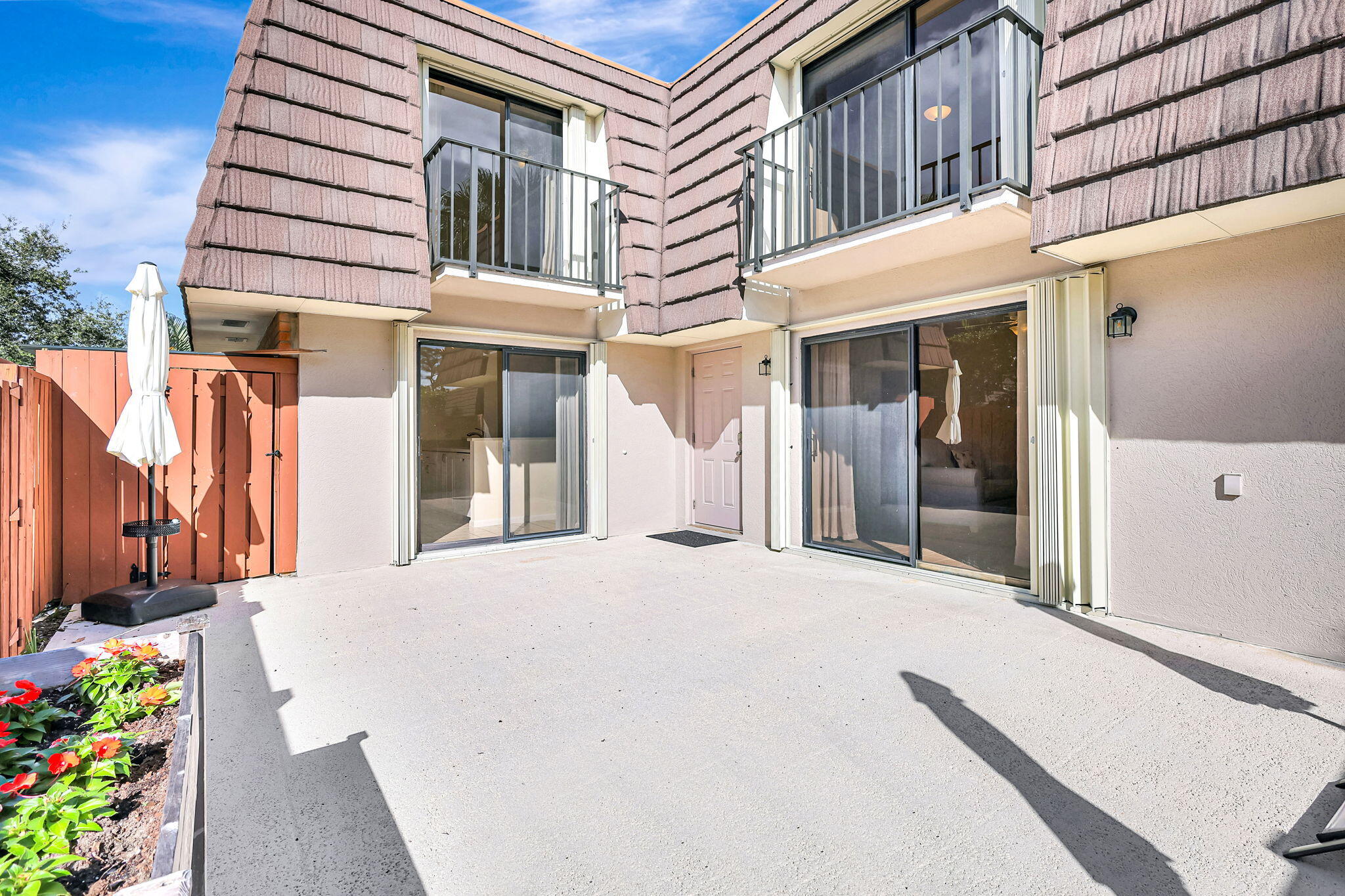 2332 23rd Court, Unit 57D Jupiter, FL 33477 - Photo 4 of 53 a front view of a building