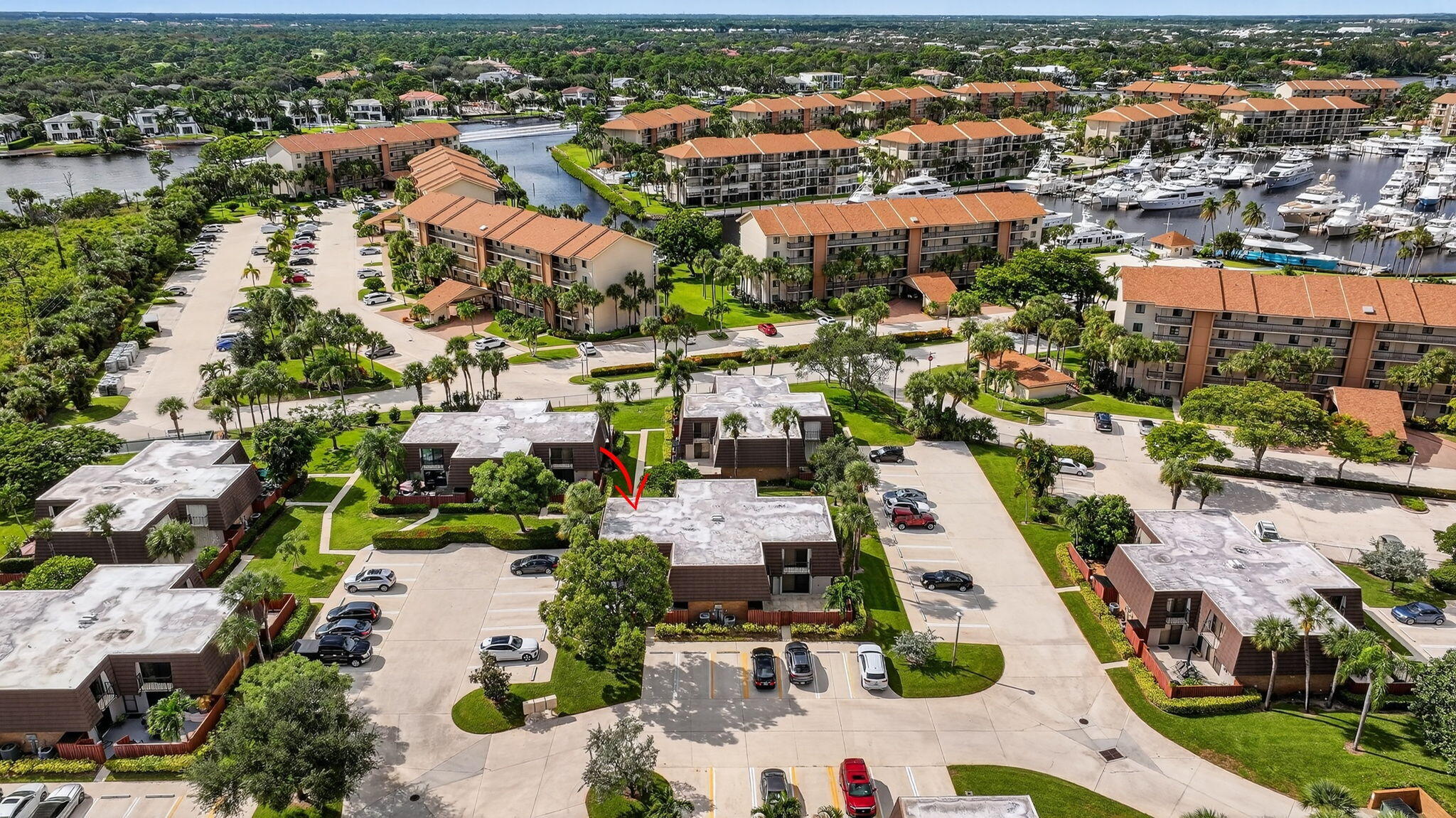 2332 23rd Court, Unit 57D Jupiter, FL 33477 - Photo 44 of 53 an aerial view of residential houses with outdoor space