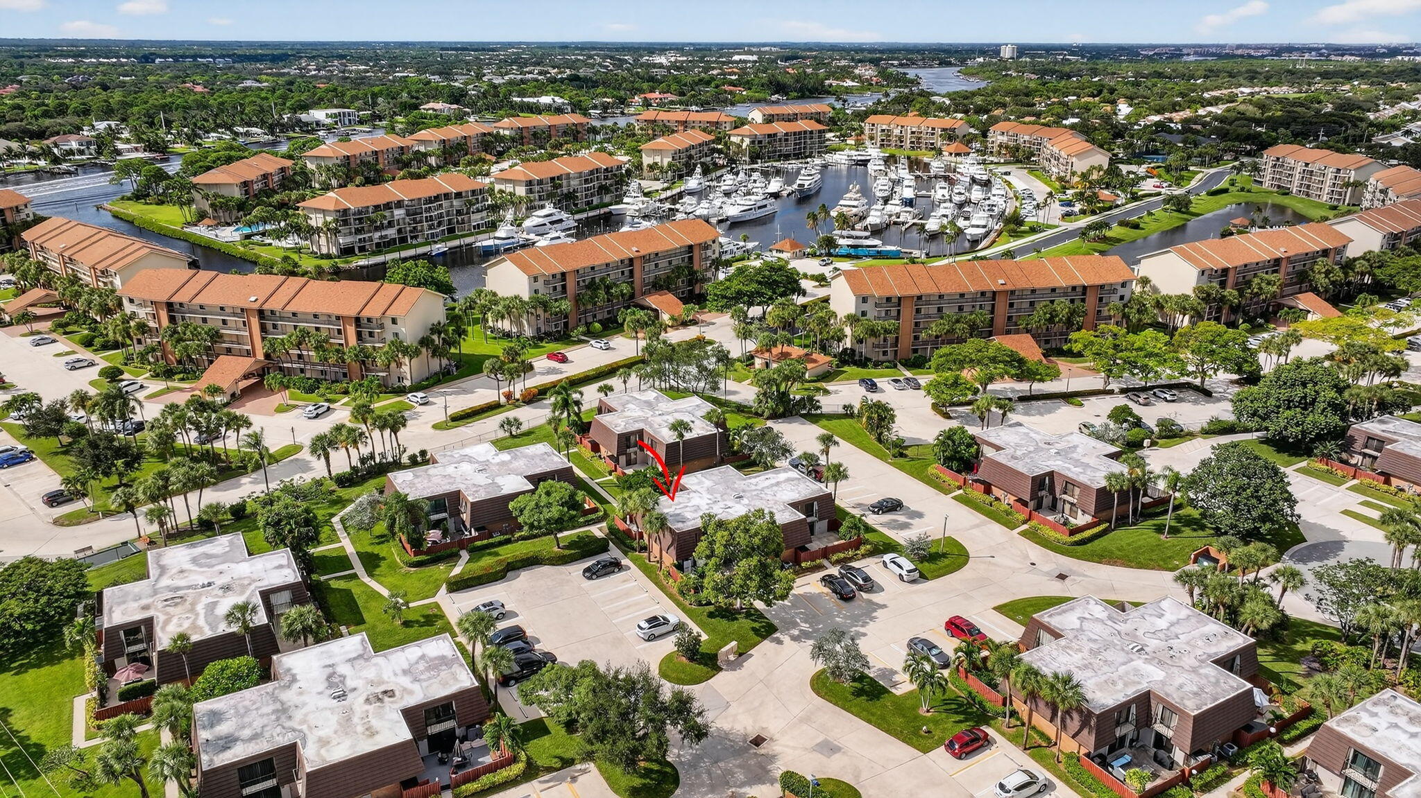2332 23rd Court, Unit 57D Jupiter, FL 33477 - Photo 45 of 53 an aerial view of residential houses with outdoor space