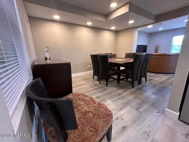 a view of a dining room with furniture