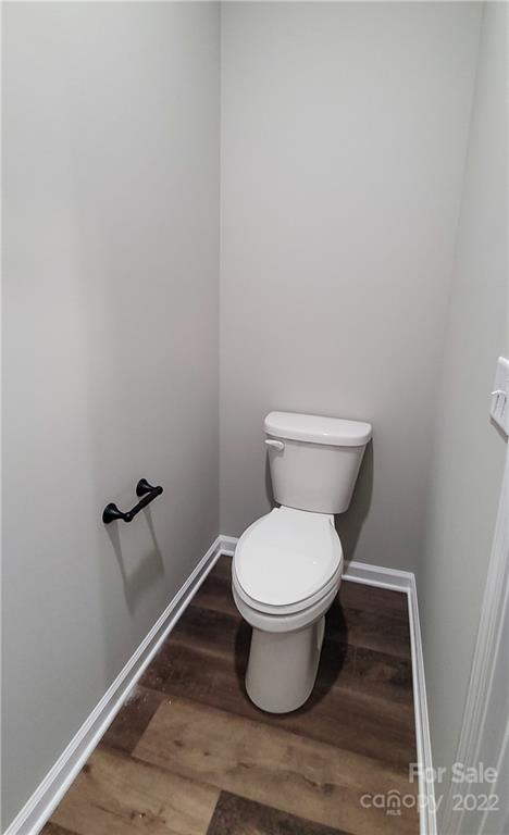 152 Eagles Landing Morganton, NC 28655 - Photo 16 of 27 a white toilet sitting next to a shower