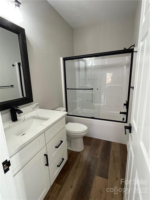 152 Eagles Landing Morganton, NC 28655 - Photo 22 of 27 a bathroom with a sink toilet and shower