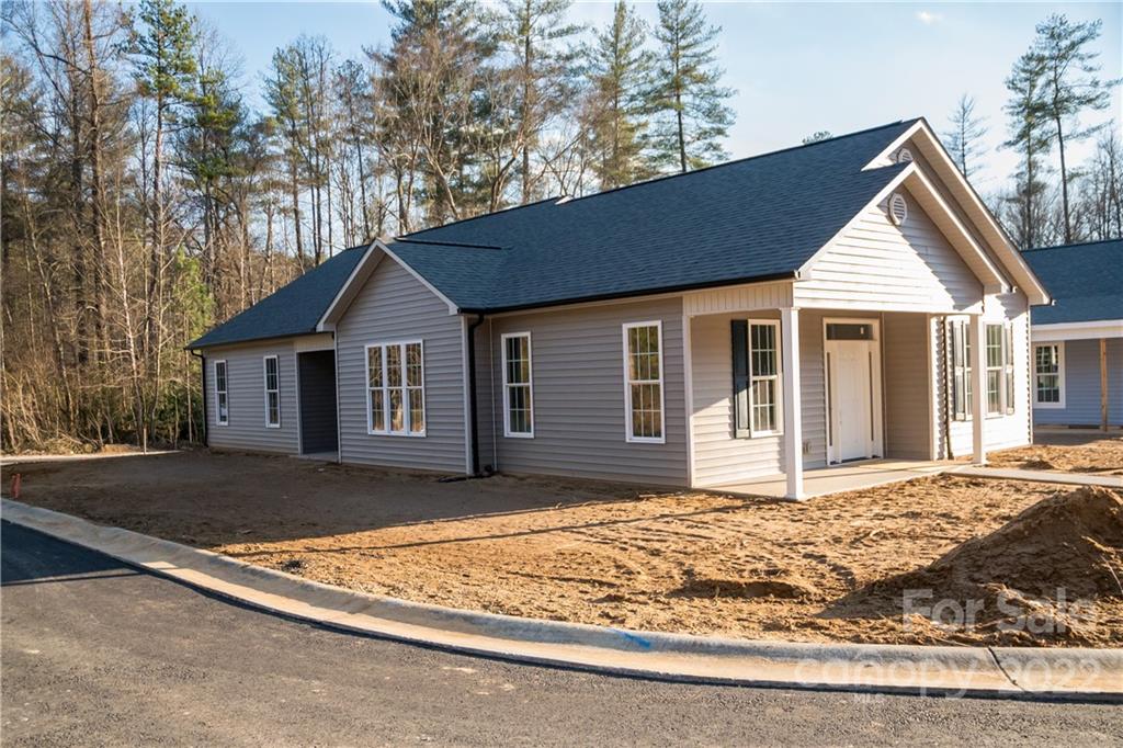 152 Eagles Landing Morganton, NC 28655 - Photo 25 of 27 a front view of a house with a yard
