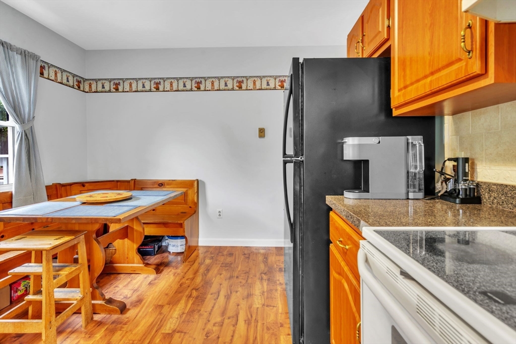 2018 Central Street Three Rivers, MA 01080 - Photo 12 of 42 a kitchen with stainless steel appliances granite countertop a refrigerator a sink and dishwasher