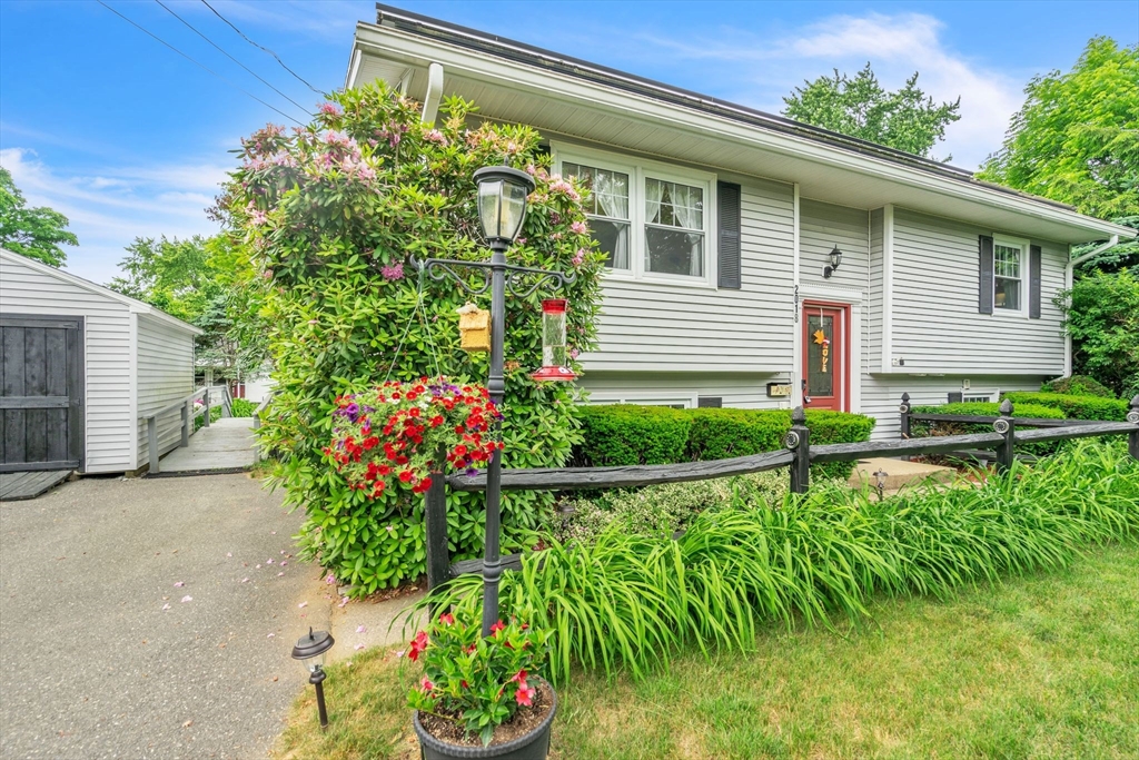 2018 Central Street Three Rivers, MA 01080 - Photo 3 of 42 a front view of a house with a yard