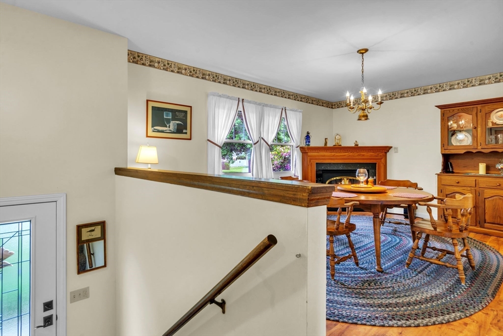2018 Central Street Three Rivers, MA 01080 - Photo 4 of 42 a living room with furniture and a chandelier