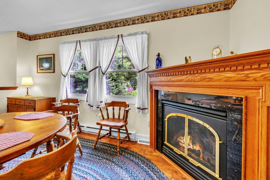 2018 Central Street Three Rivers, MA 01080 - Photo 8 of 42 a view of a livingroom with furniture and a fireplace