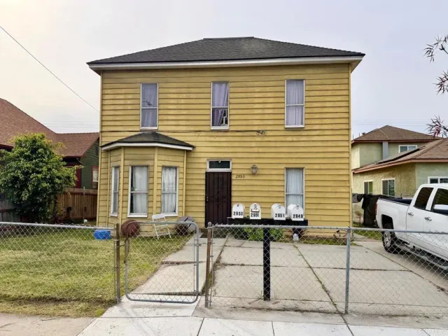 a front view of house with street