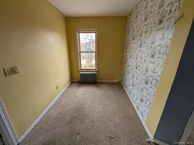 a view of entryway with window and stairs