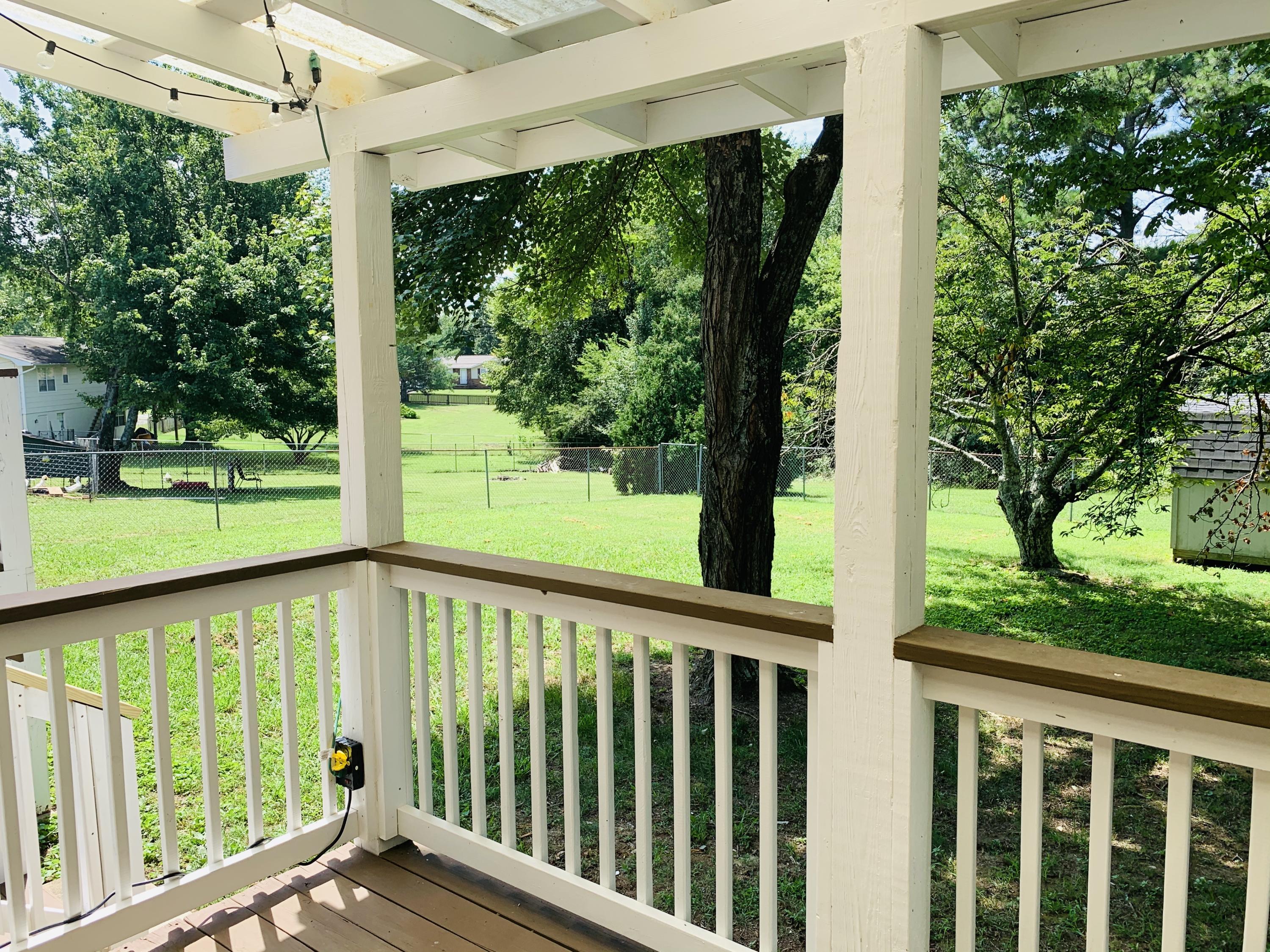 611 Worcester Road Knoxville, TN 37934 - Photo 26 of 35 Covered Deck Overlooks Level Backyard