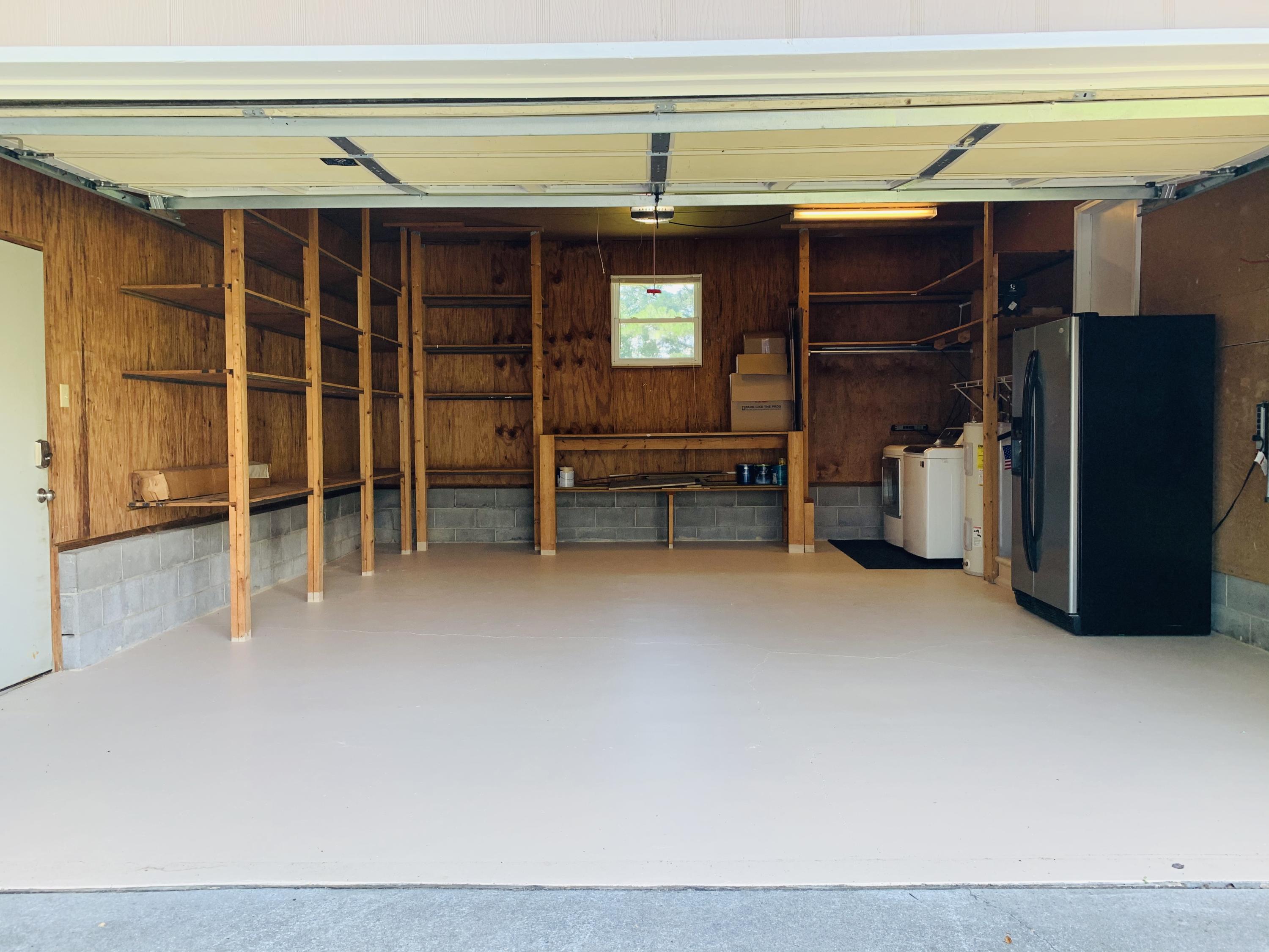 611 Worcester Road Knoxville, TN 37934 - Photo 33 of 35 2-Car Garage w/ Shelving