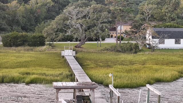 209 Shore Road Newport, NC 28570 - Photo 1 of 61 Full acre with dock, boat lift, kayak launch.