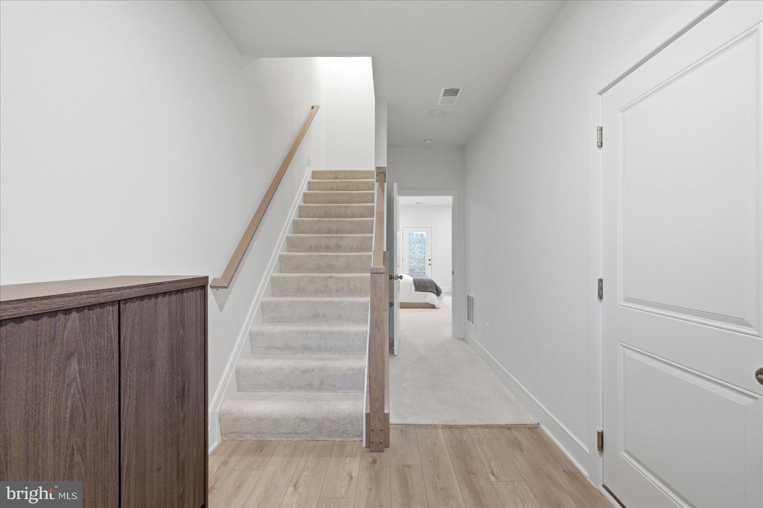 121 Checkerspot Way White Post, VA 22663 - Photo 11 of 65 a view of entryway with wooden floor