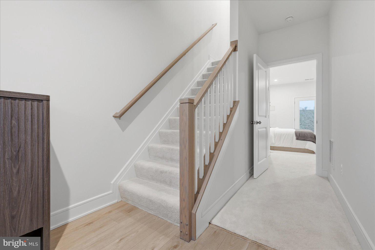 121 Checkerspot Way White Post, VA 22663 - Photo 15 of 65 a view of staircase with white walls and windows