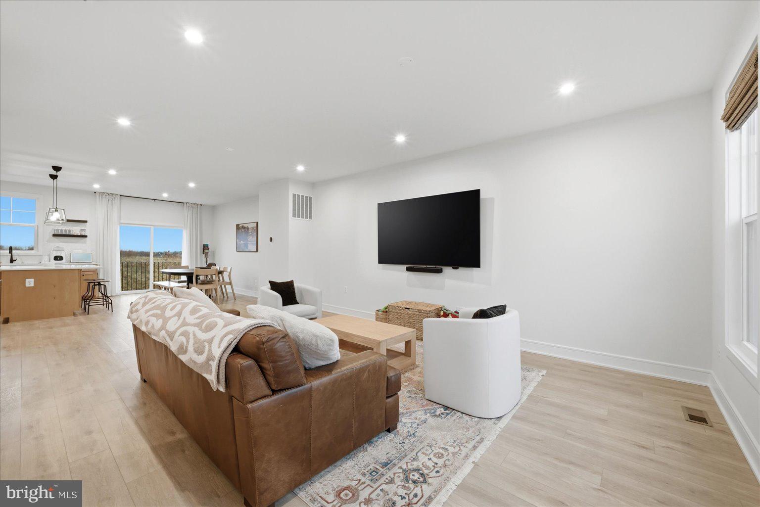 121 Checkerspot Way White Post, VA 22663 - Photo 17 of 65 a living room with furniture and a flat screen tv