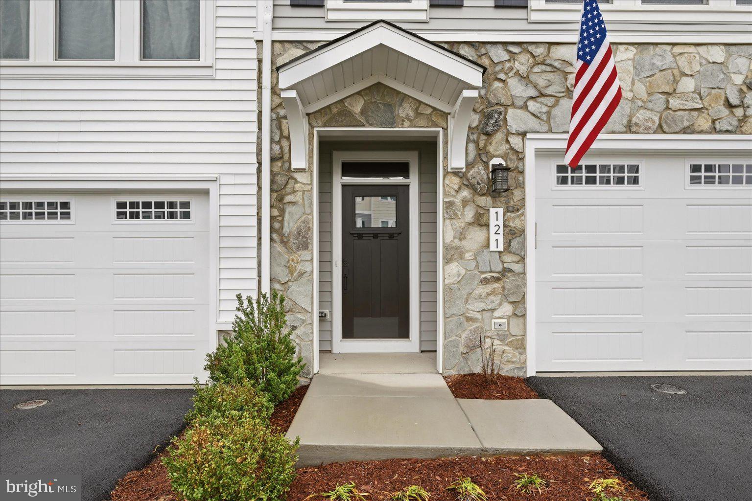 121 Checkerspot Way White Post, VA 22663 - Photo 2 of 65 a front view of a house with a garage