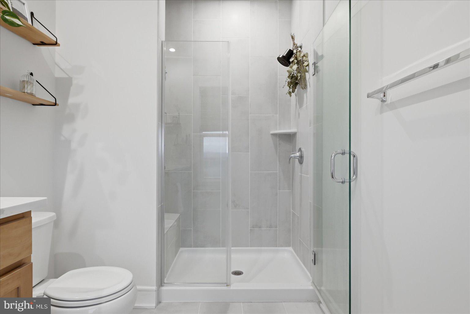 121 Checkerspot Way White Post, VA 22663 - Photo 24 of 65 a bathroom with a shower a toilet and a shower