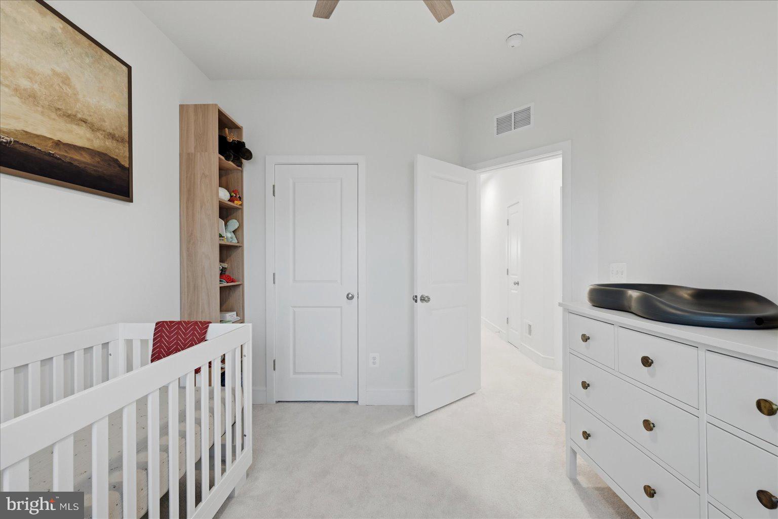 121 Checkerspot Way White Post, VA 22663 - Photo 28 of 65 a kitchen with granite countertop white cabinets and sink