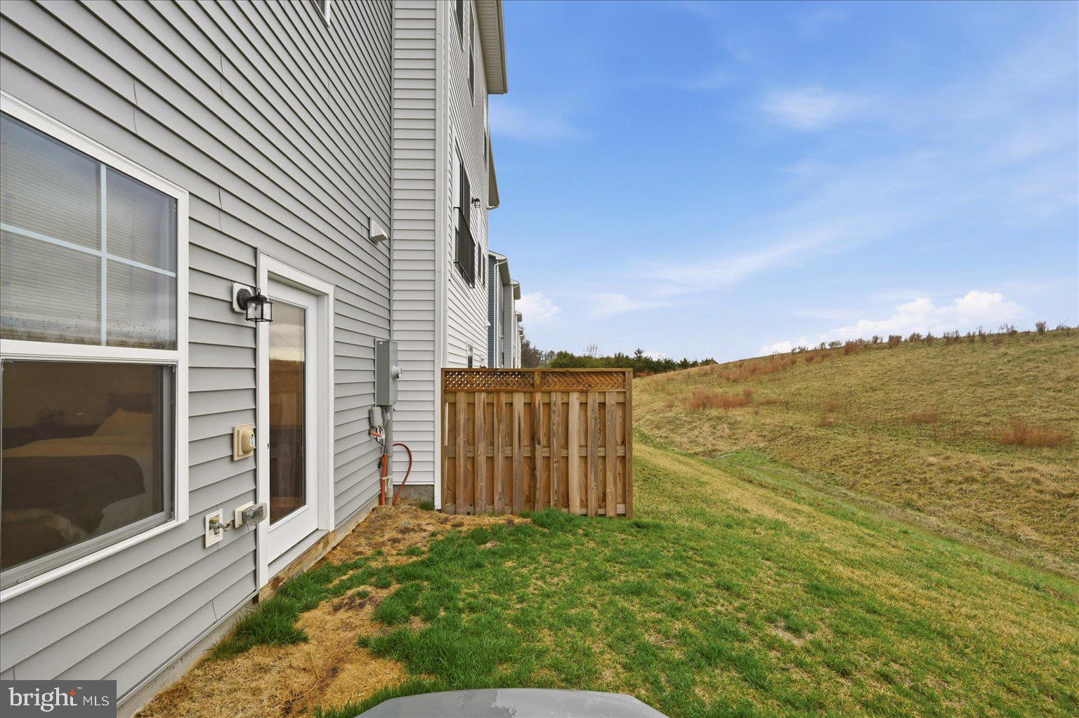 121 Checkerspot Way White Post, VA 22663 - Photo 33 of 65 a view of a terrace with wooden floor and a flat screen tv