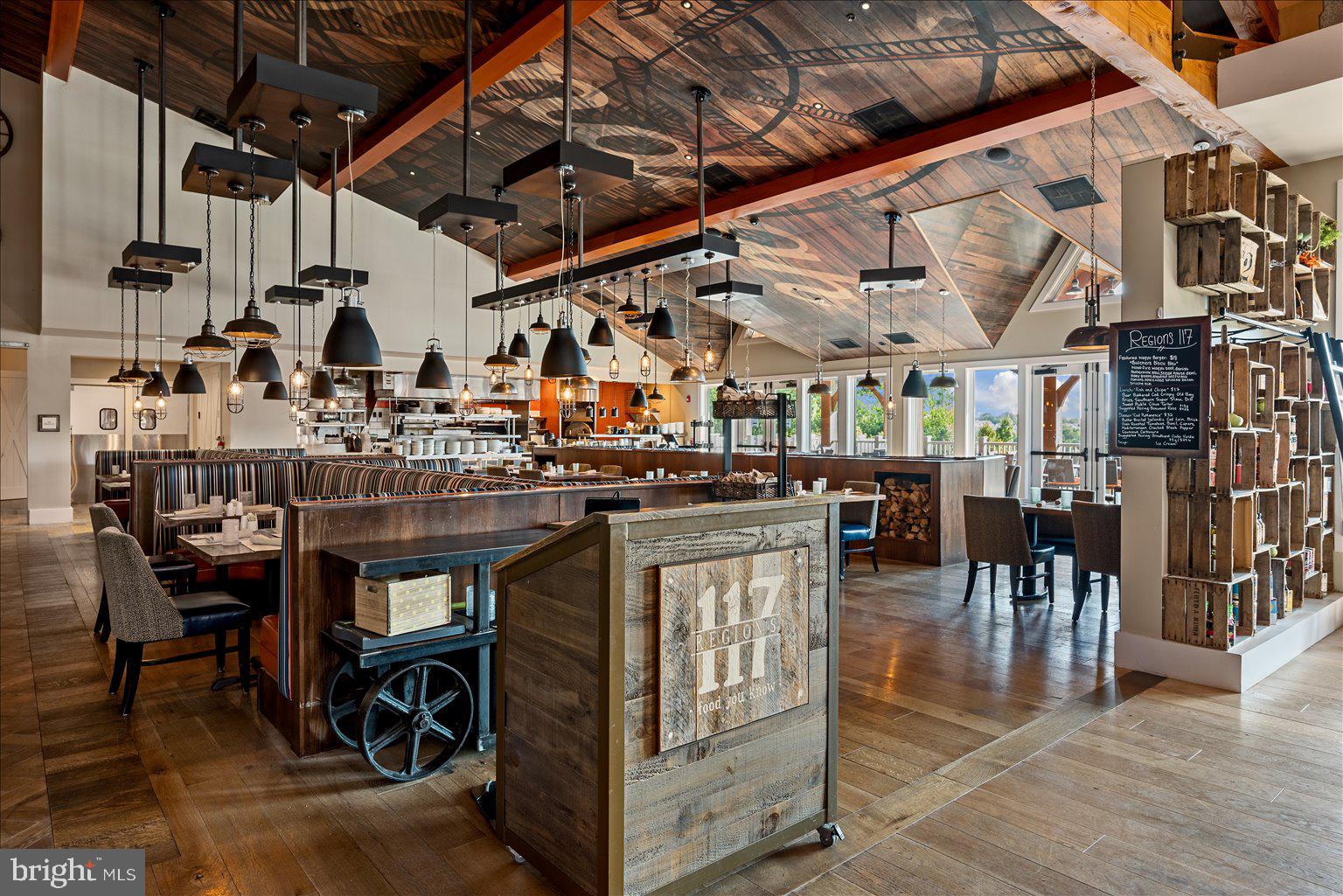 121 Checkerspot Way White Post, VA 22663 - Photo 51 of 65 a kitchen with lots of wooden furniture a table and chairs