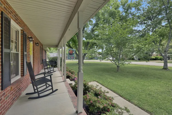 a view of a couches in backyard of the house